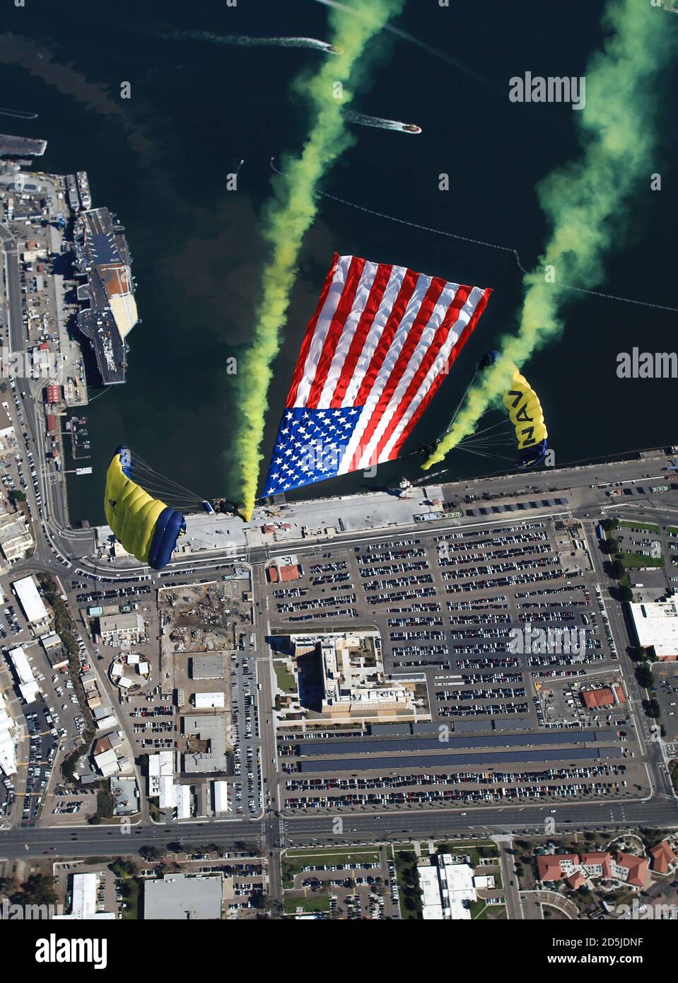 Members of the U.S. Navy Parachute Team, the Leap Frogs, conduct a demonstration jump into Naval Air Station North Island in support of the 245th Navy Birthday on October 13, 2020. The Navy Parachute Team began in 1969 when Navy SEALs and Underwater Demolition Team (UDT) members volunteered at weekend air shows. The team was officially commissioned the Leap Frogs in 1974 by the Chief of Naval Operations with the mission to demonstrate Navy excellence throughout the United States. (U.S. Navy photo by Jim Woods/Released) Stock Photo