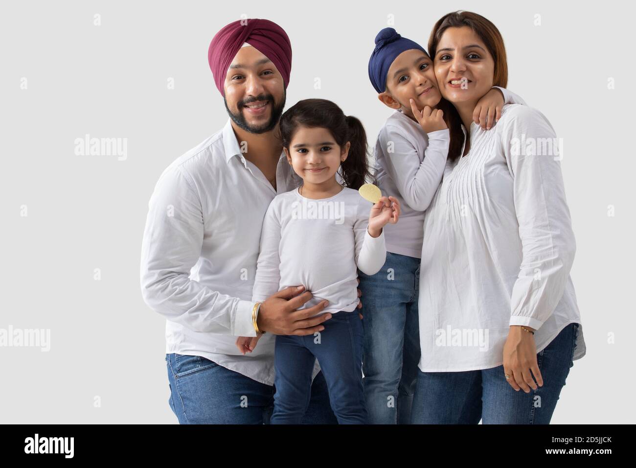 A SIKH FAMILY ENJOYING TIME TOGETHER Stock Photo