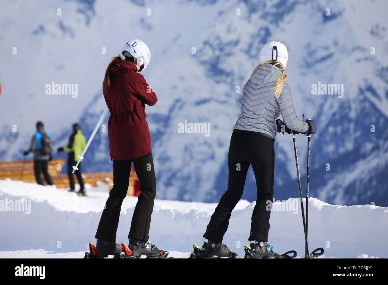 Two female skiers before the next descent Stock Photo