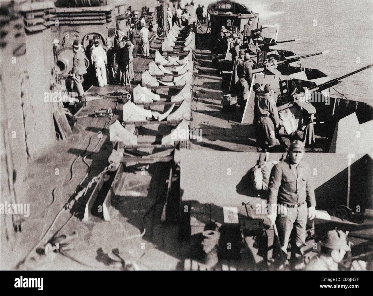 View of the upper deck of the Japanese light cruiser “Kitakami”. The photo shows equipment for the transportation of manned torpedoes “Kaiten”. Kitaka Stock Photo