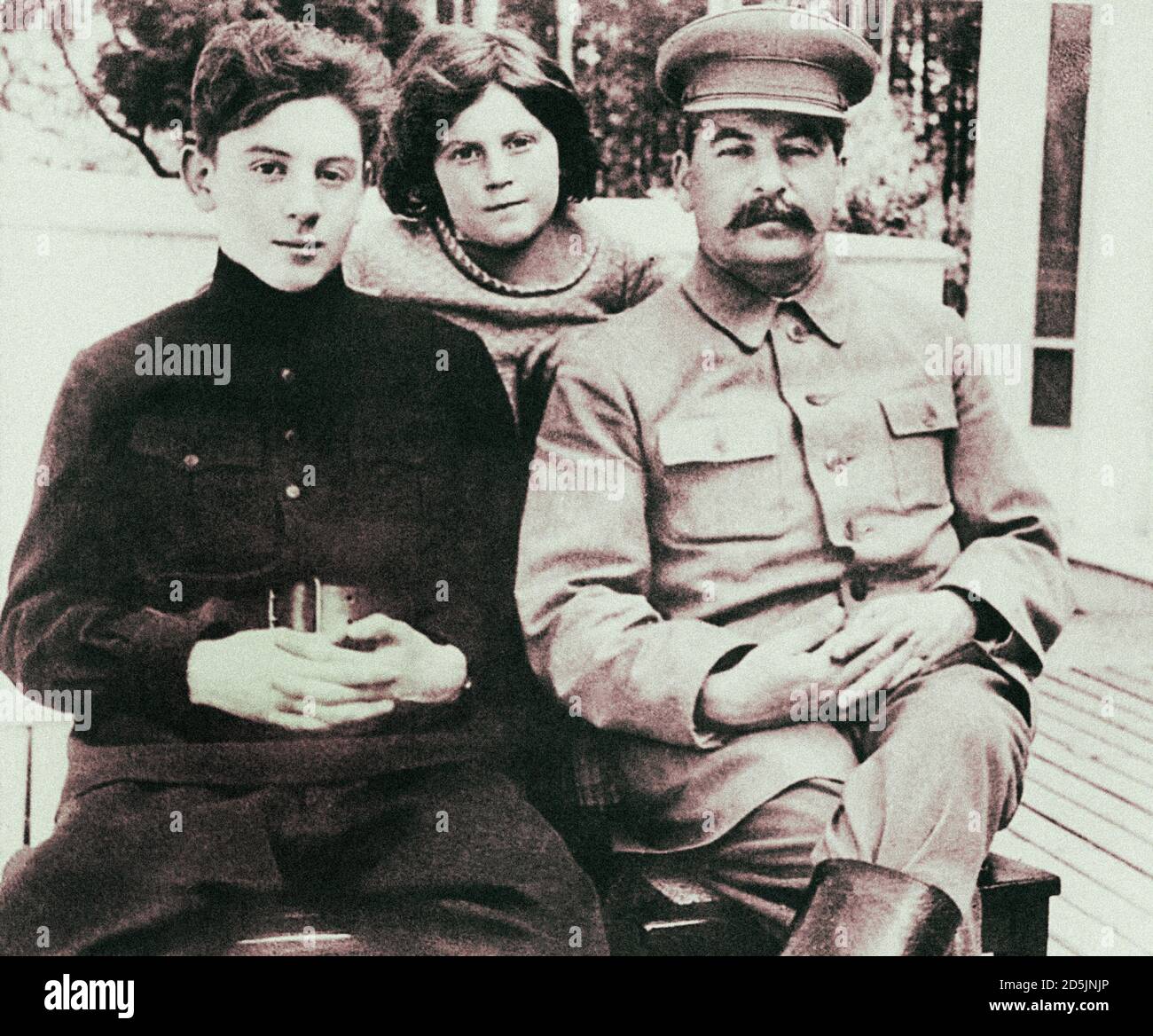 Archival photo of Joseph Stalin with his son, Vasily, and a daughter, Svetlana. 1930s Stock Photo
