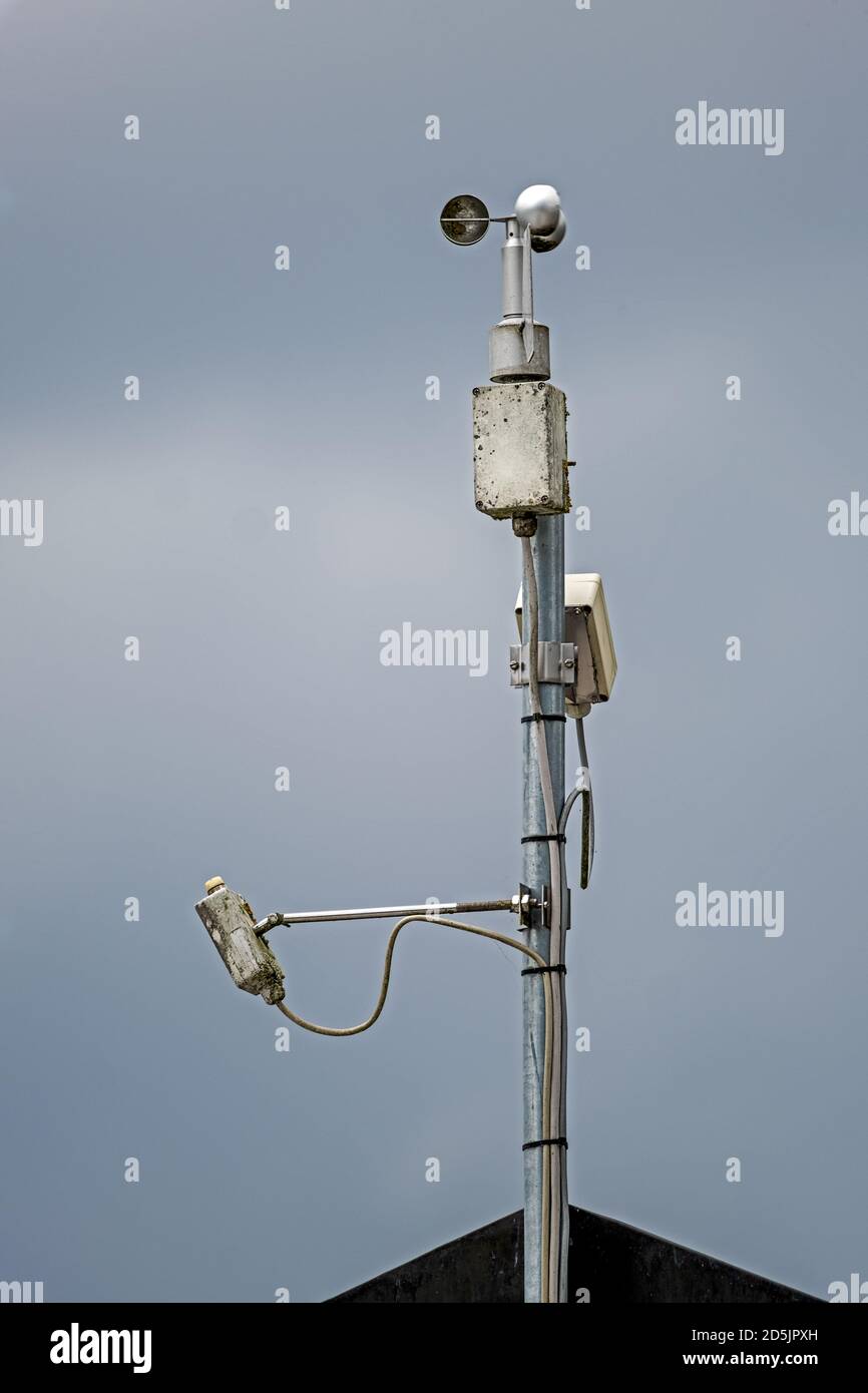 device for measuring the speed of the wind on a house roof Stock Photo