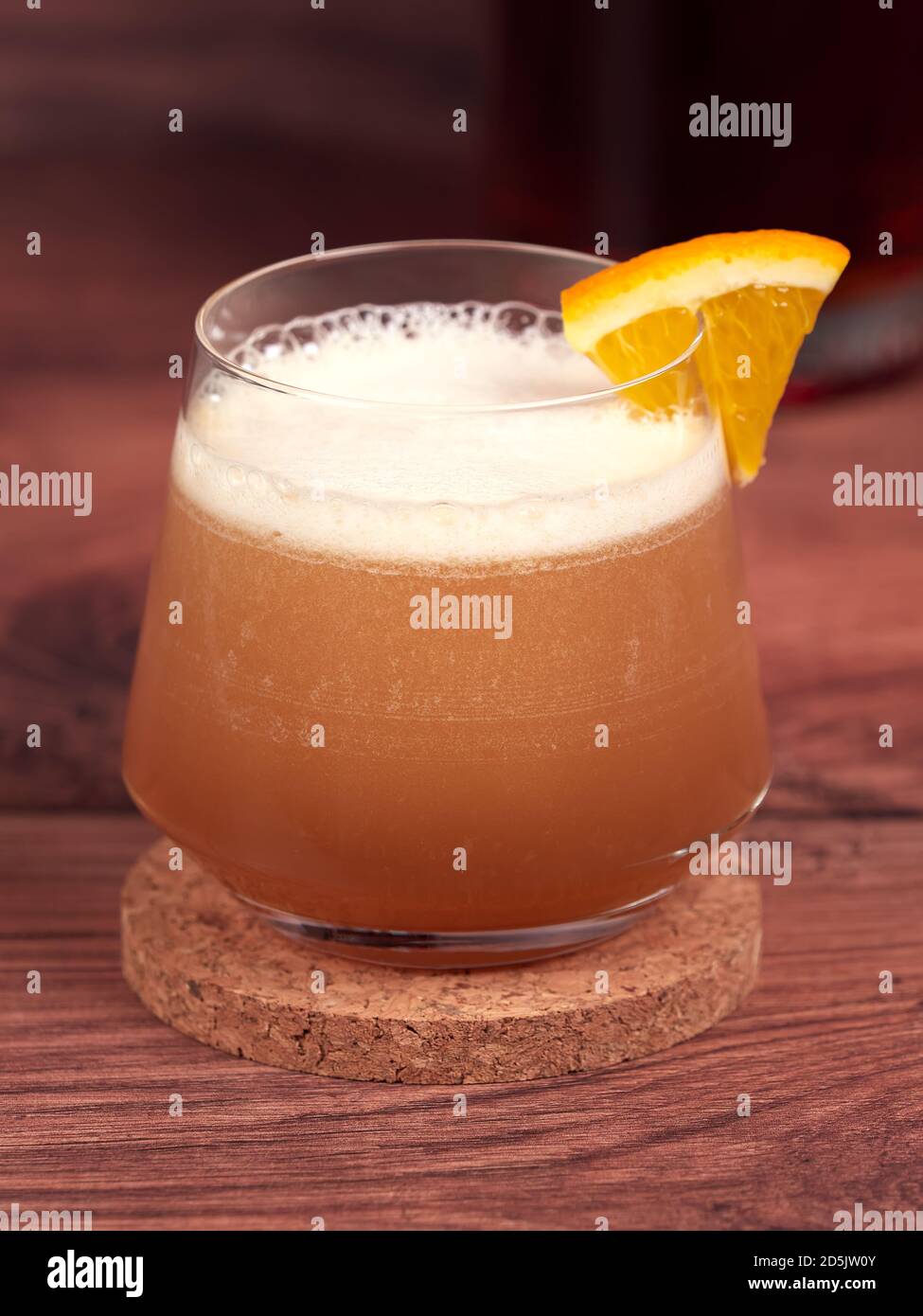 Amaretto sour a cocktail made with amaretto liqueur, lemon juice, simple syrup and egg white