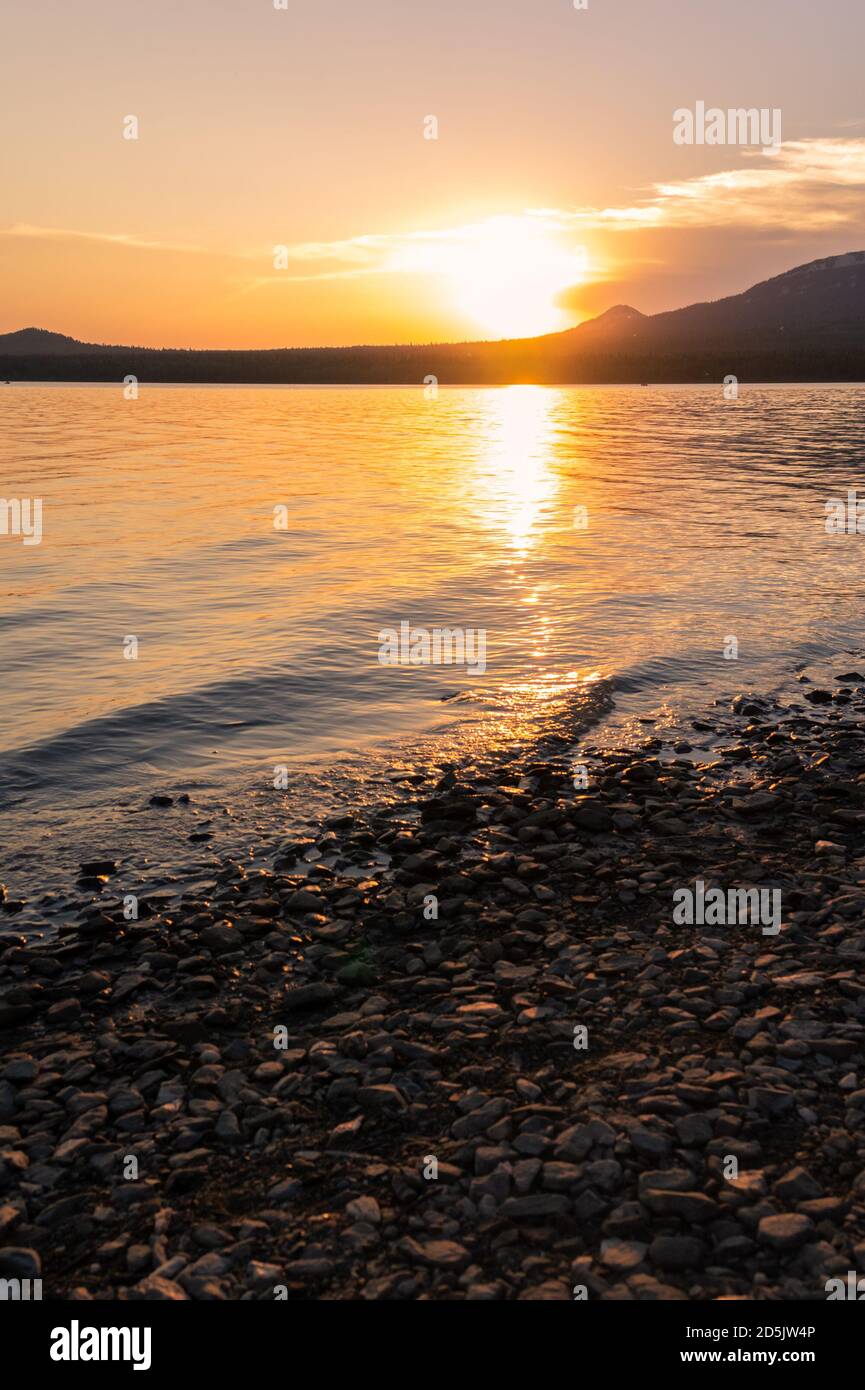 Sunset scene on lake. Summer Stock Photo