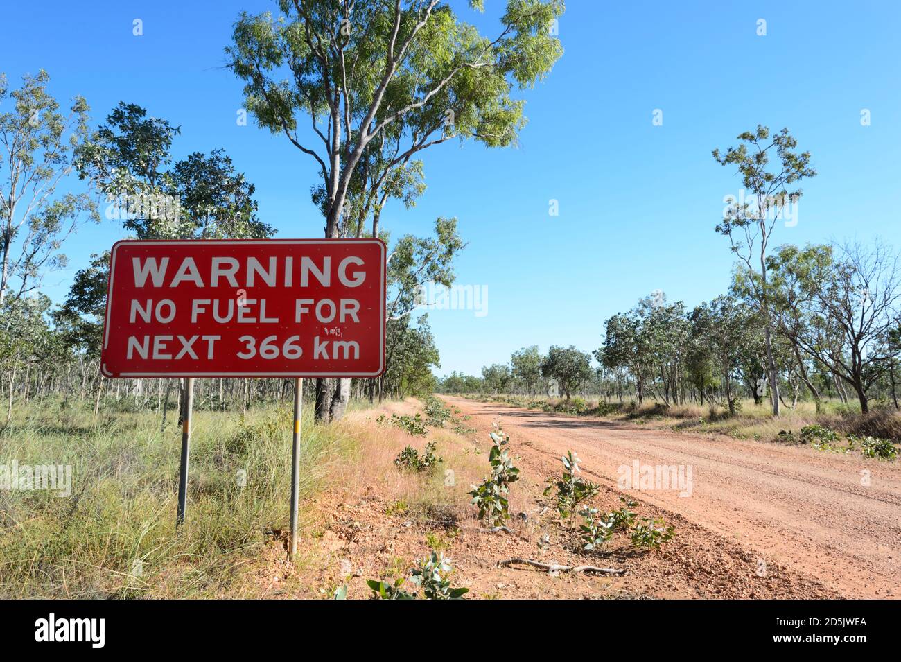 No fuel warning sign on a remote Outback dirt road near Borroloola, Northern Territory, NT, Australia Stock Photo
