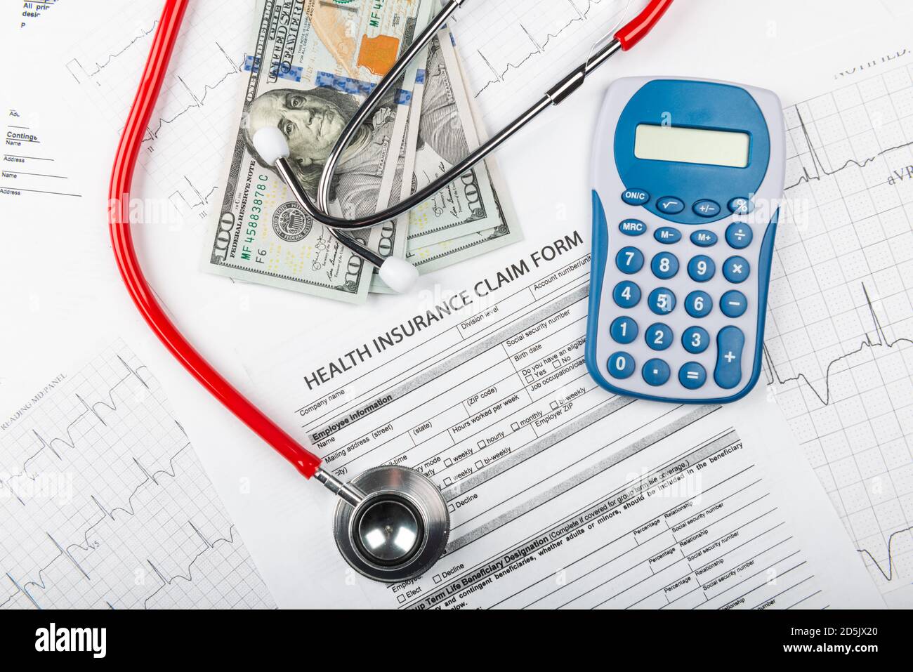 Health care costs. Stethoscope and calculator symbol for health care costs or medical insurance Stock Photo