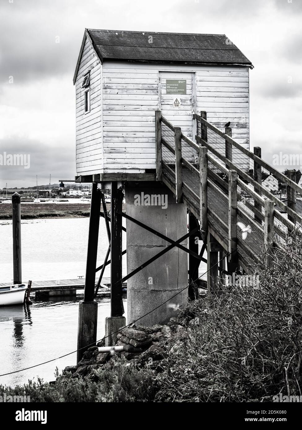 Sea tide monitoring station on a dull day at Wells-Next-The-Sea, Norfolk, UK. Stock Photo