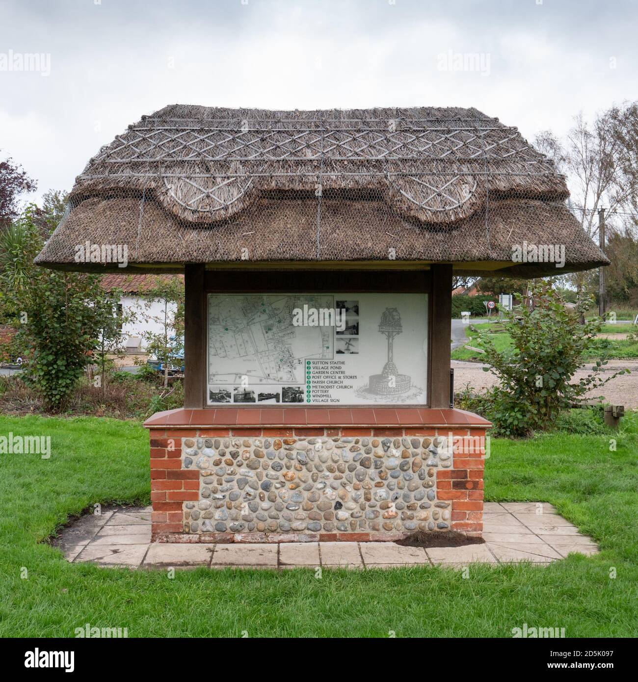 Thatched information board at Sutton Staithe, Norfolk, UK on a dull day. Stock Photo