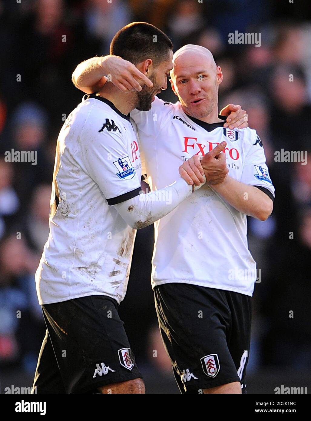 Fulham's Clint Dempsey (left) celebrates with team mate Andrew Johnson after scoring his side's first goal of the game Stock Photo
