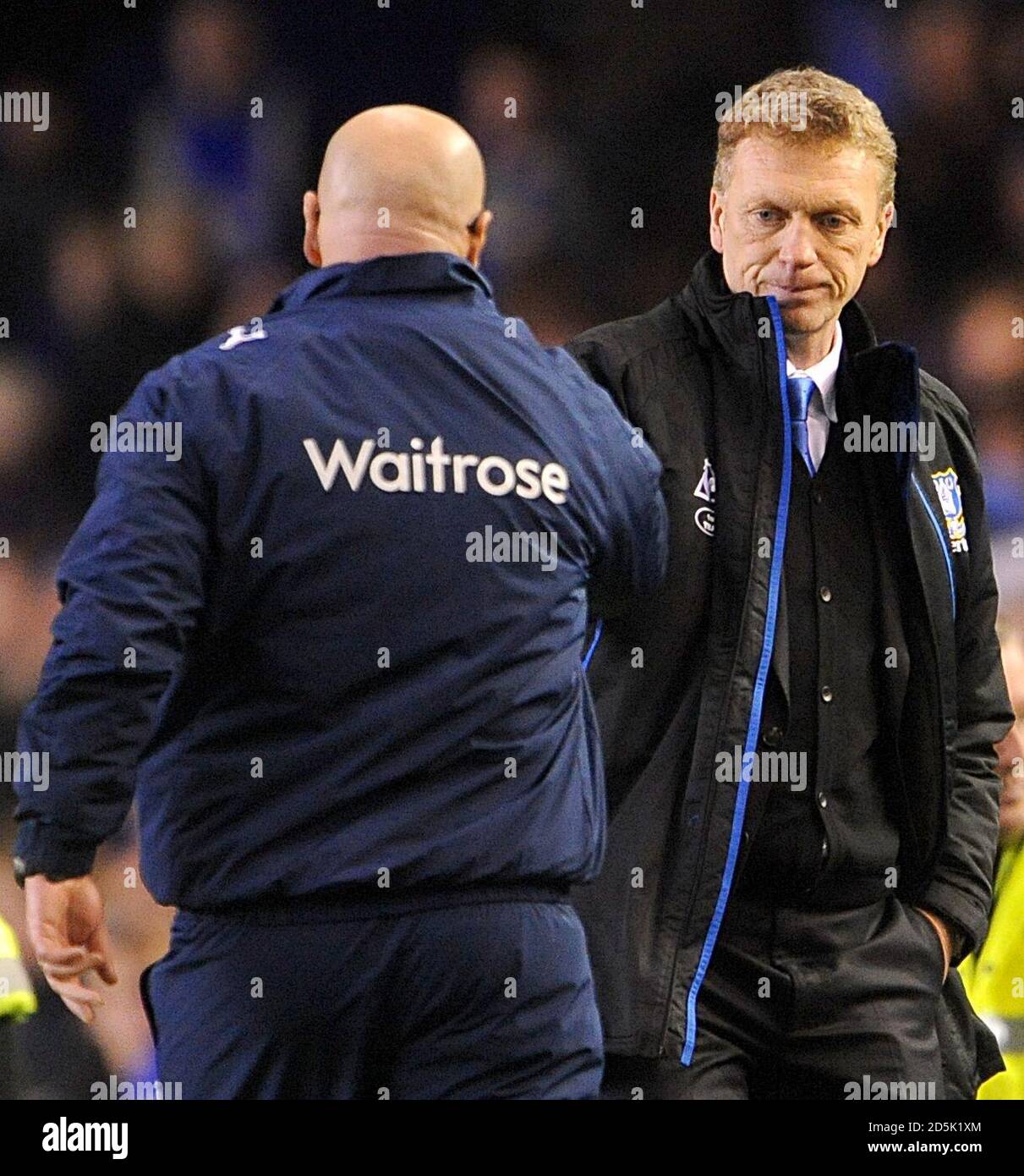 Reading manager Brian McDermott (left) and Everton manager David Moyes shake hands after the final whistle. Stock Photo
