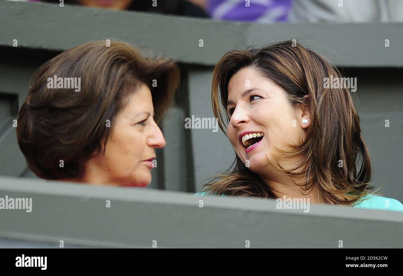 Mirka Vavrinec (right), wife of Switzerland's Roger Federer watches his match against France's Jo Wilfried Tsonga on day nine of the 2011 Wimbledon Championships at the All England Lawn Tennis and Croquet Club, Wimbledon. Stock Photo