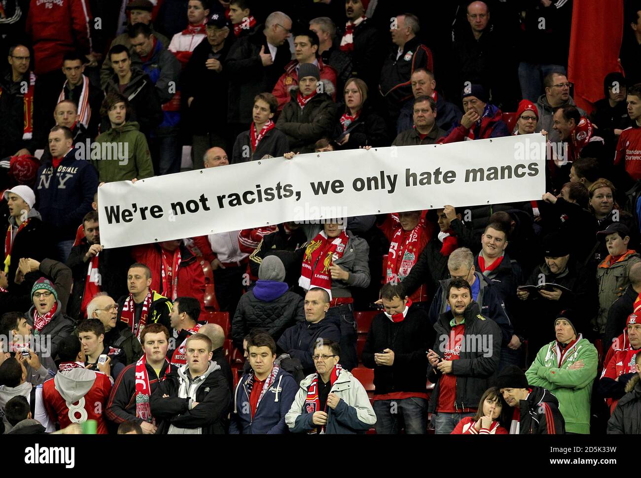 liverpool-fans-hold-up-a-banner-in-response-to-the-racist-accusations-towards-the-club-2D5K33W.jpg