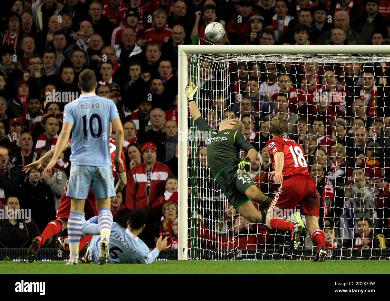 Manchester City goalkeeper Joe Hart makes a good save from Liverpool's Martin Skrtel Stock Photo