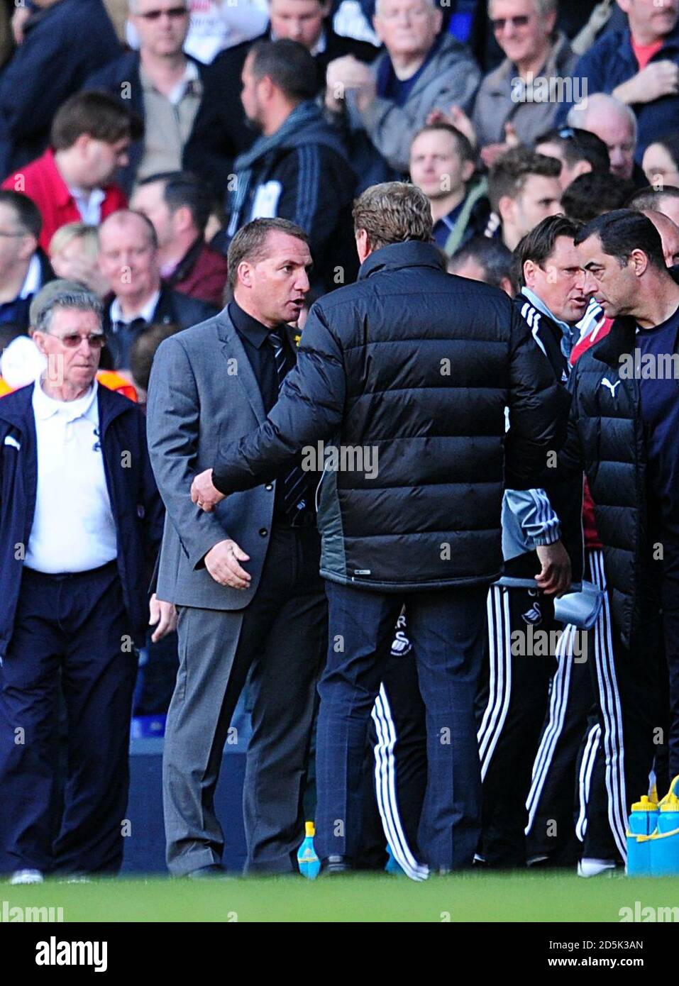 Swansea City manager Brendan Rodgers (left) and Tottenham Hotspur manager Harry Redknapp (right) after the final whistle Stock Photo