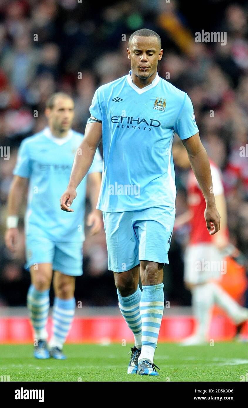 Manchester City's Vincent Kompany dejected after the final whistle Stock Photo