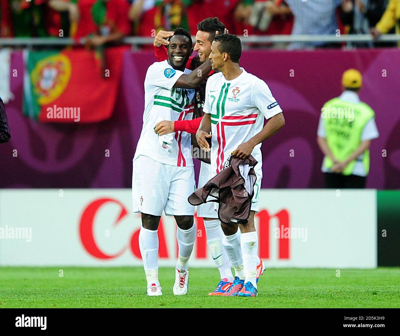 Portugal's Silvestre Varela (left), Hugo Miguel Lopes (centre) and Luis Nani celebrate after the final whistle Stock Photo