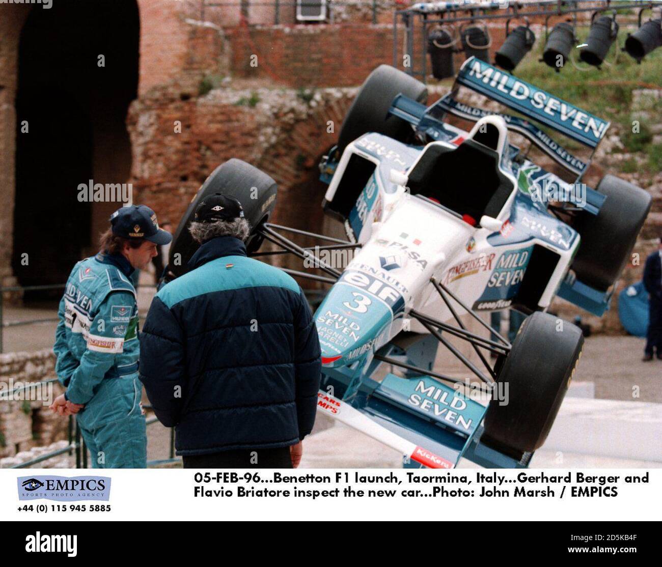 05-FEB-96. Benetton F1 launch, Taormina, Italy. Gerhard Berger and rFlavio  Briatore inspect the new car Stock Photo - Alamy