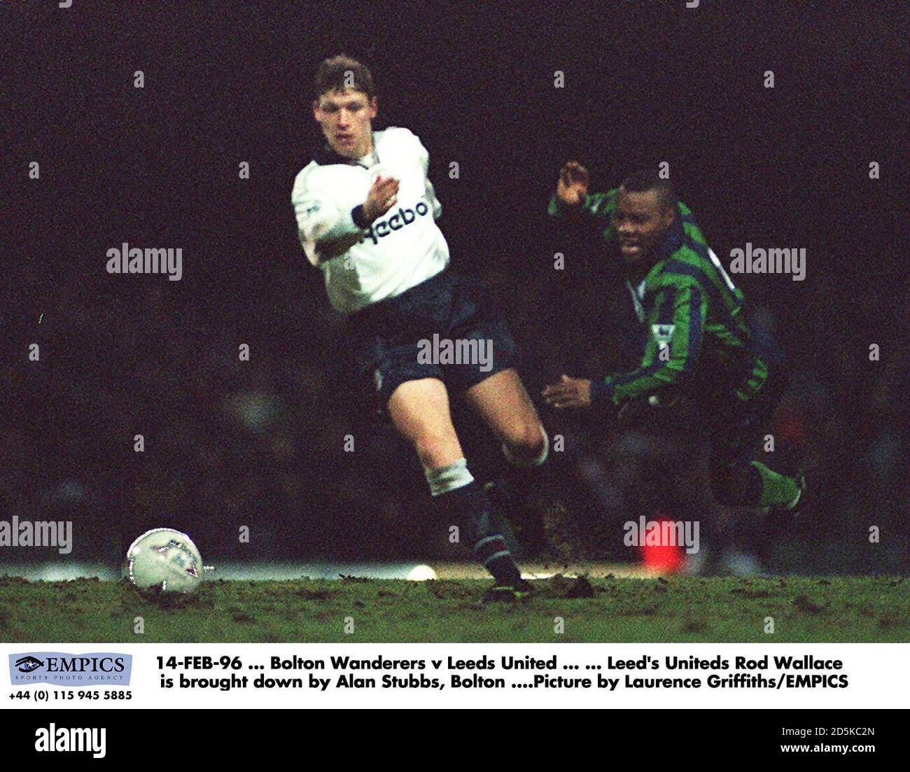 14-FEB-96 ... Bolton Wanderers v Leeds United ... ... Leeds United's Rod Wallace is brought down by Alan Stubbs of Bolton ....Picture by Laurence Griffiths/EMPICS Stock Photo
