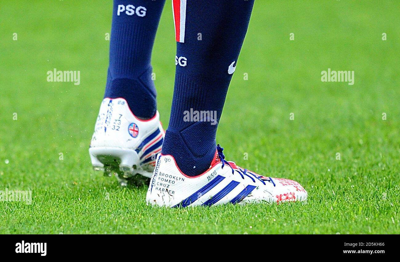 A general view of David Beckham's football boots with his children's names  on the heel Stock Photo - Alamy