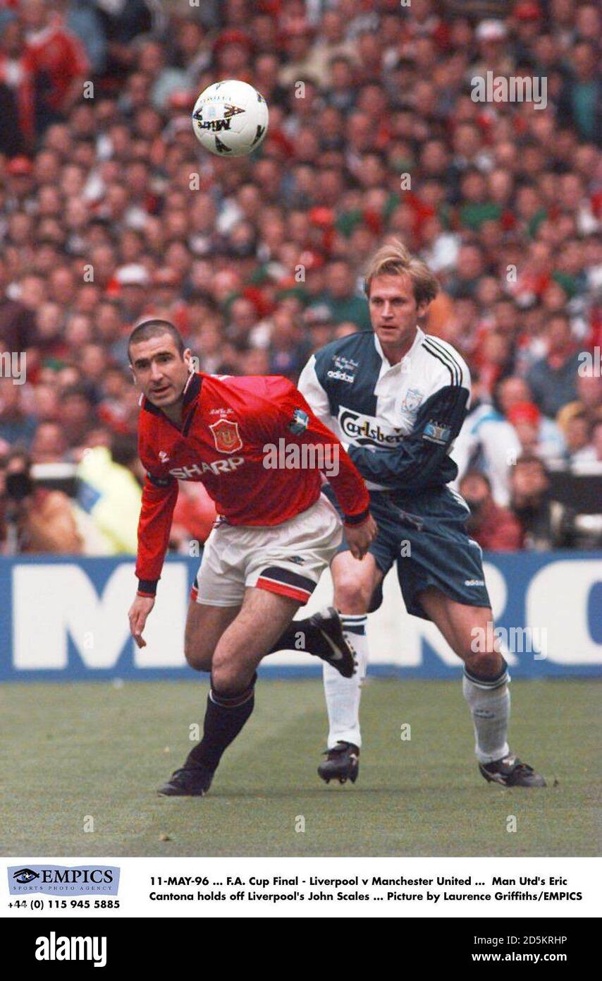 11-MAY-96 ... F.A. Cup Final - Liverpool v Manchester United ...  Manchester United's Eric Cantona holds off Liverpool's John Scales ... Picture by Laurence Griffiths/EMPICS Stock Photo