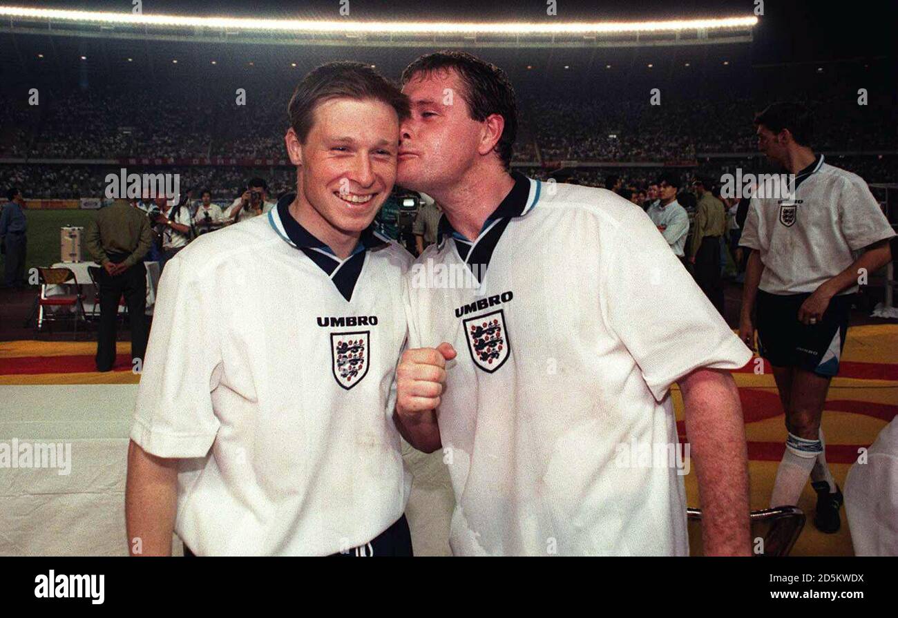 England's Paul Gascoigne gives Nick Barmby a kiss after beating China Stock Photo