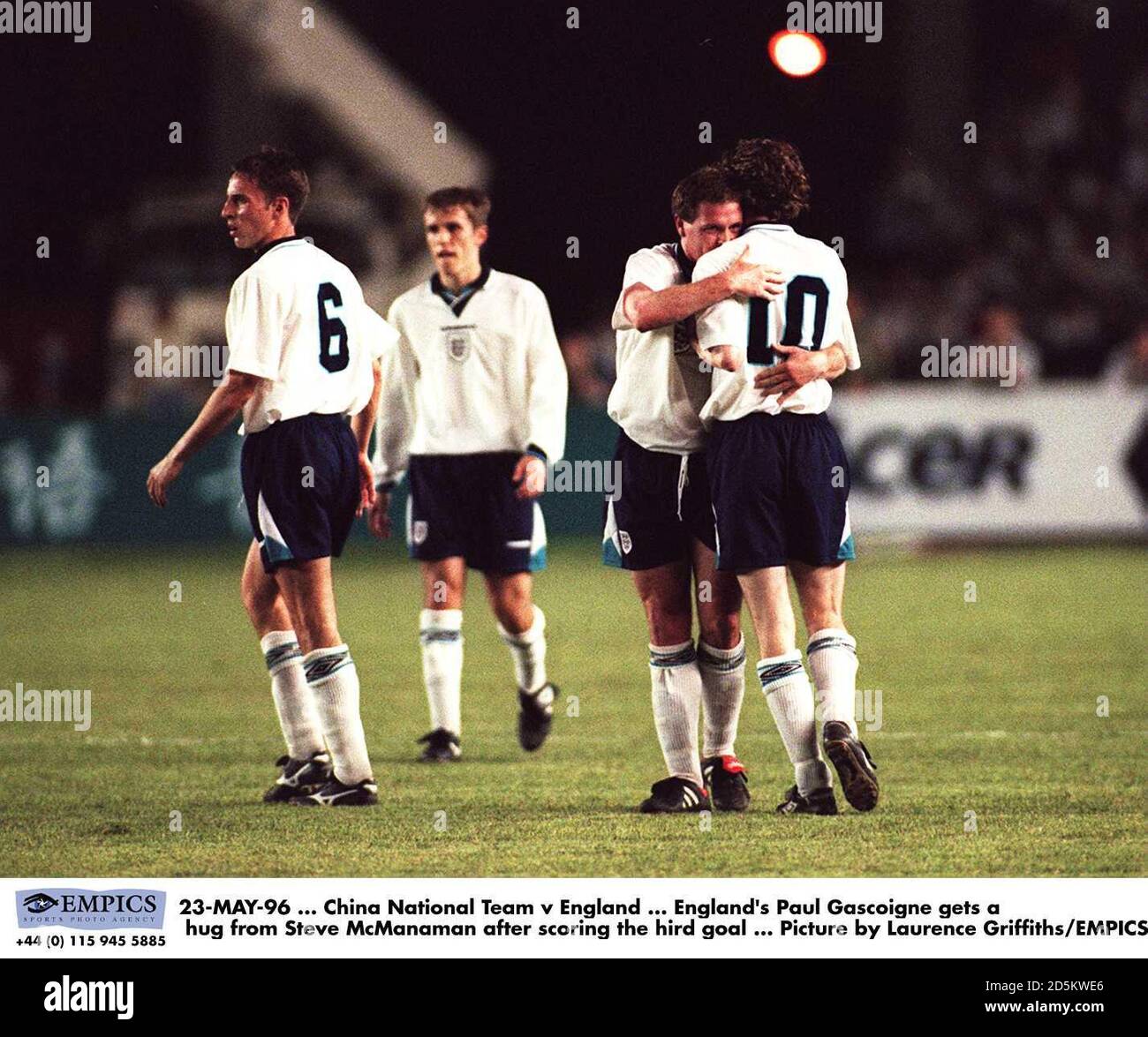 England's Paul Gascoigne gets a hug from Steve McManaman after scoring the third goal Stock Photo