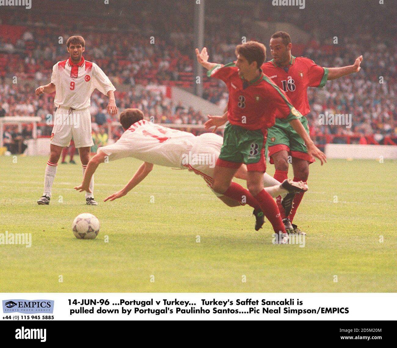 14 Jun 96 Portugal V Turkey Turkey S Saffet Sancakli Is Pulled Down By Portugal S Paulinho