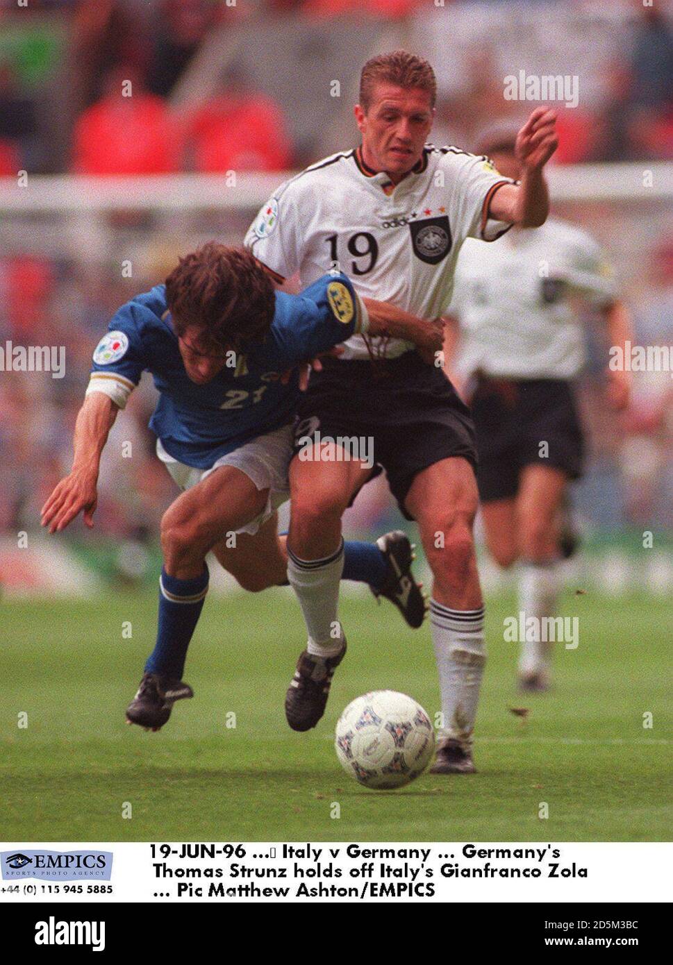 19-JUN-96 ...  Italy v Germany ... Germany's Thomas Strunz holds off Italy's Gianfranco Zola Stock Photo