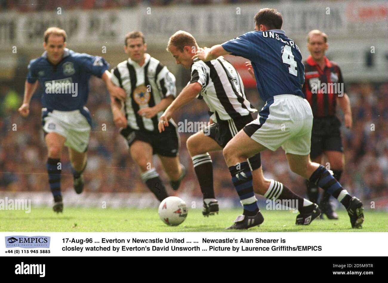 17-Aug-96 ... Everton v Newcastle United ... ...  Newcastle's Alan Shearer is closley watched by Everton's David Unsworth ... Picture by Laurence Griffiths/EMPICS Stock Photo