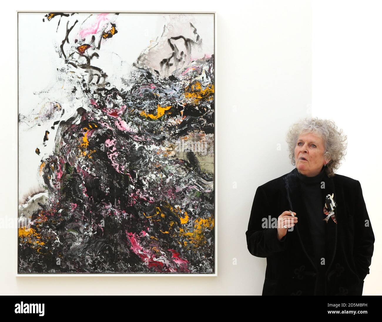 British artist Maggi Hambling stands next to her work 'Covid Spring' whilst attending her new exhibition at the Marlborough Gallery, London. Stock Photo
