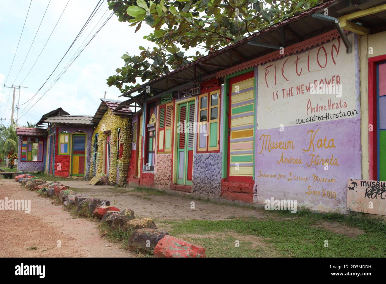 Group of houses colorfully painted with mural on the wall Stock Photo