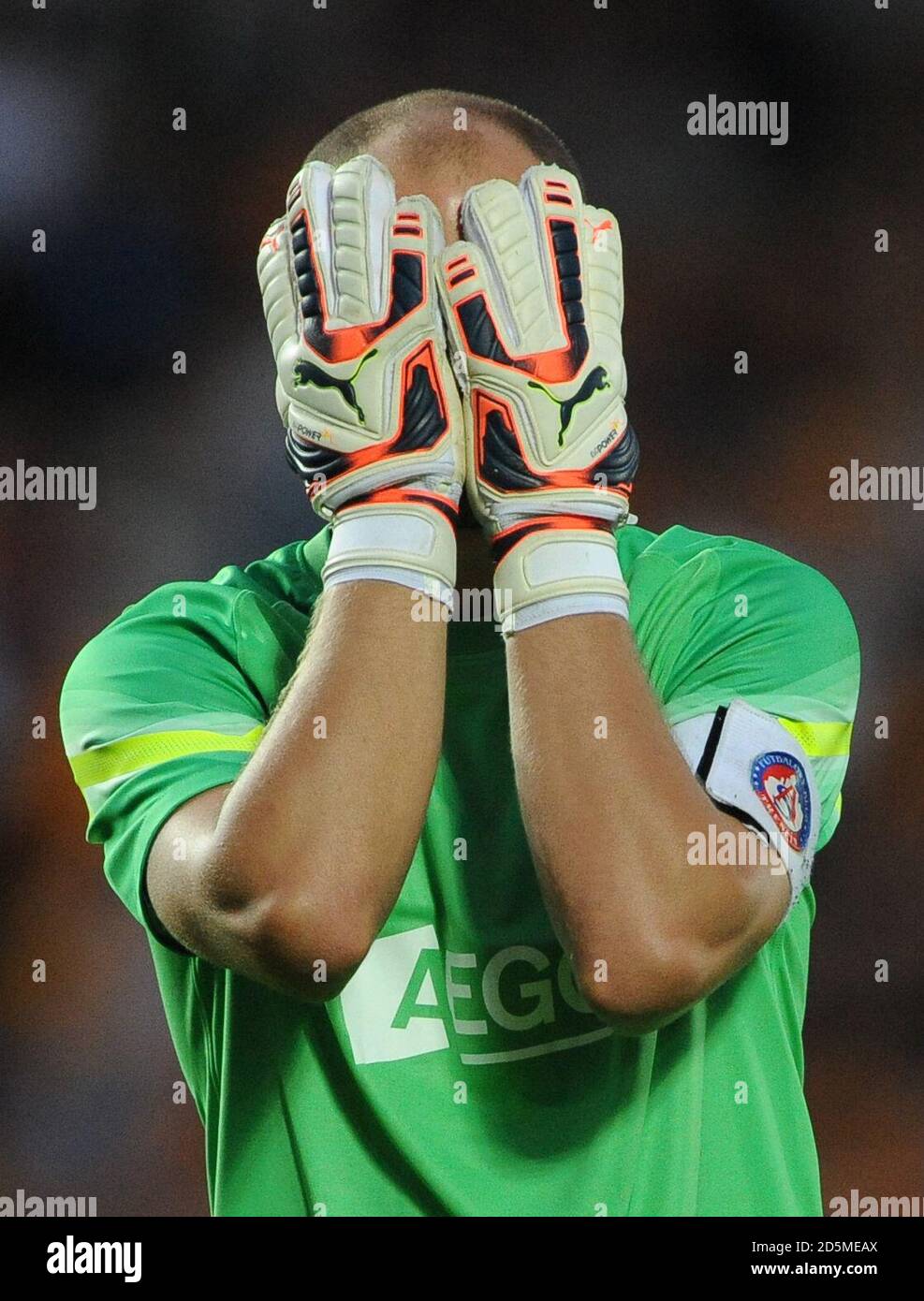Trencin's goalkeeper, Milos Volesak holds his head in his hands during the game against Hull City. Stock Photo