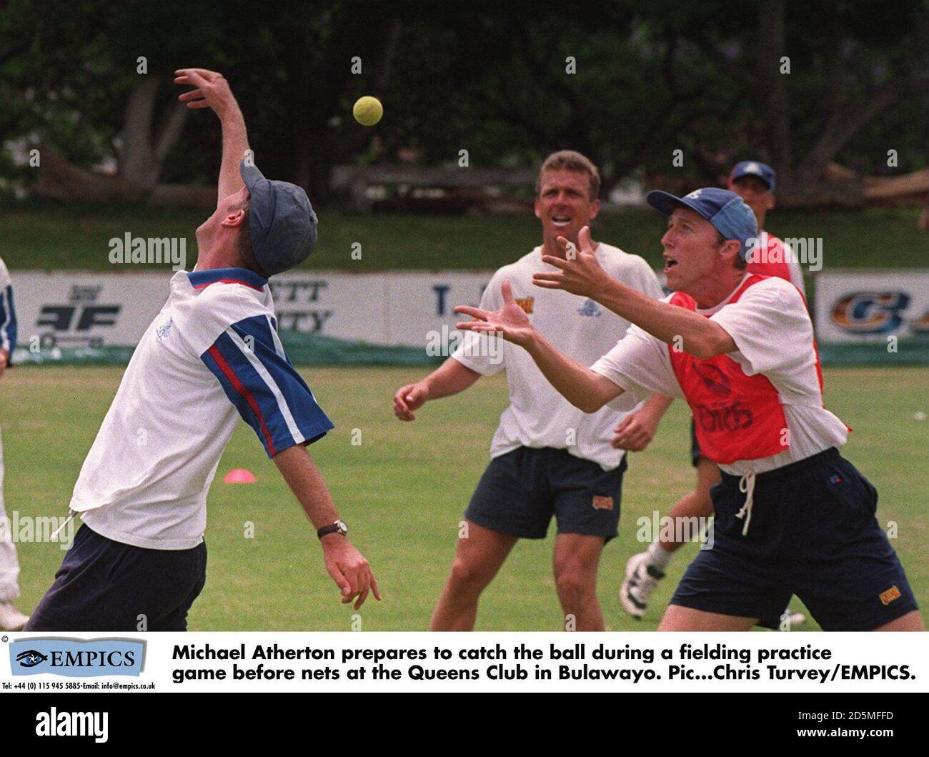 Michael Atherton prepares to catch the ball during a fielding practice