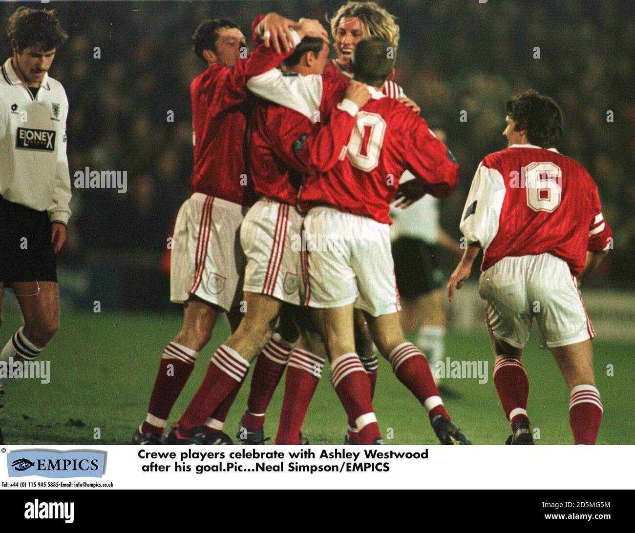 Crewe players celebrate with Ashley Westwood after his goal Stock Photo