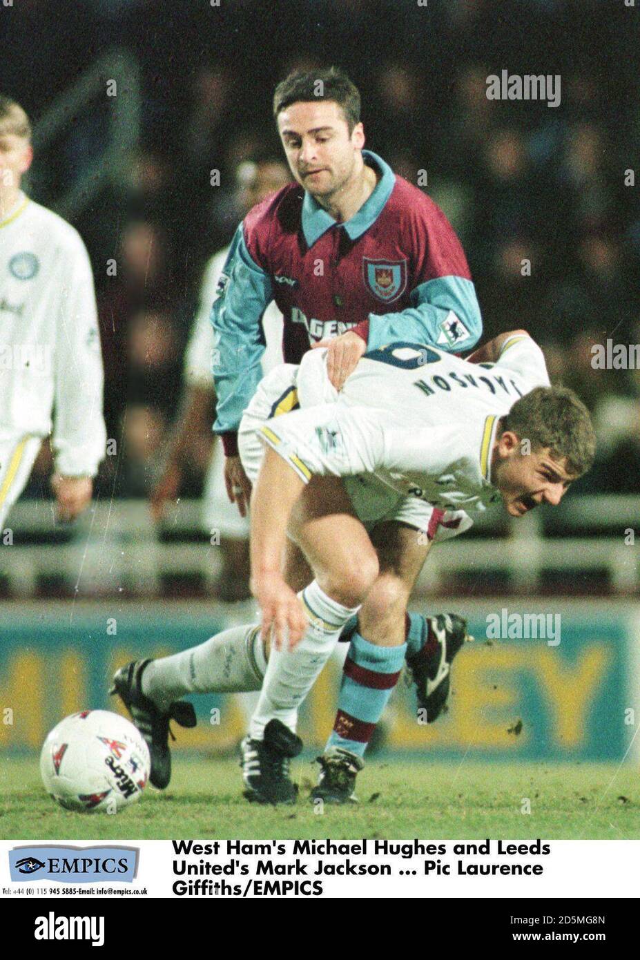 West Ham's Michael Hughes and Leeds United's Mark Jackson Stock Photo