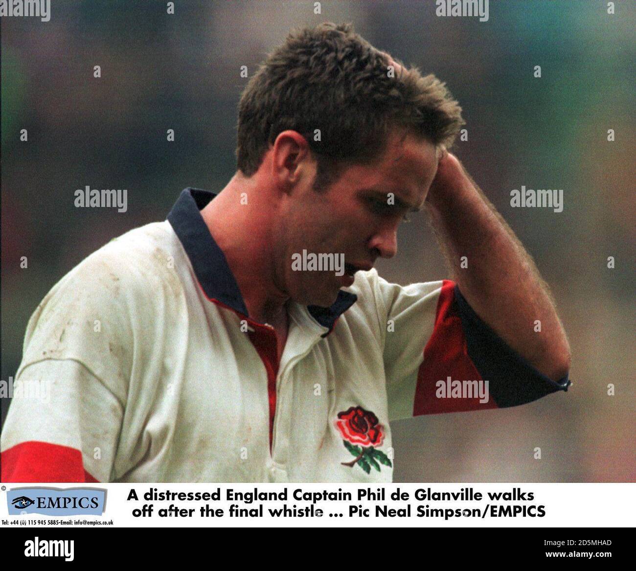 A distressed England Captain Phil de Glanville walks off after the final whistle Stock Photo