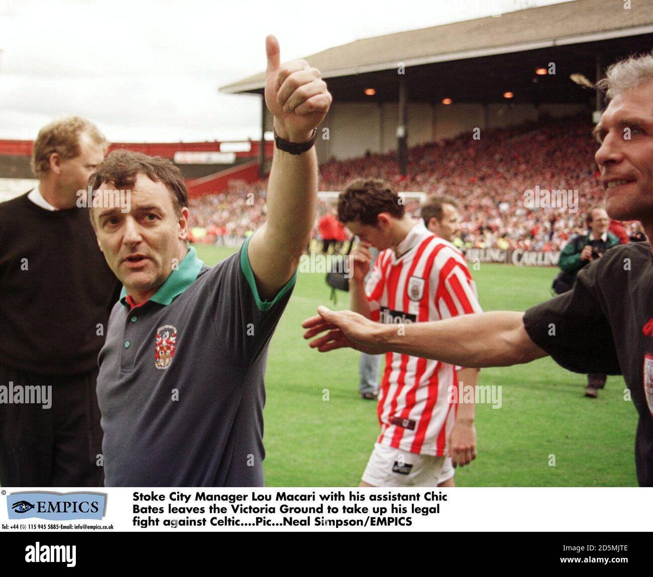 Lou Macari with his assistant Chic Bates leaves the Victoria Ground to take up his legal fight against Celtic Stock Photo