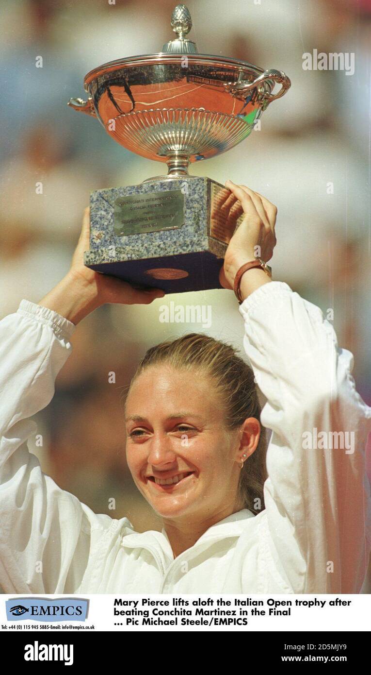 Mary Pierce lifts aloft the Italian Open trophy afterrbeating Conchita Martinez in the Final Stock Photo