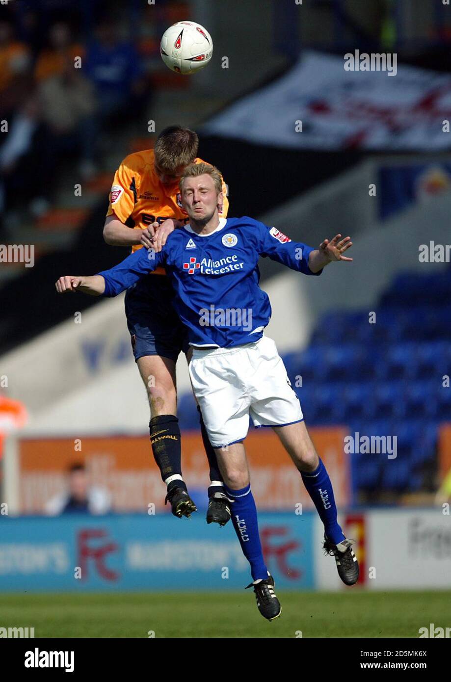 Leicester City's Stephen Hughes loses out in the air to Millwall's Tony Craig Stock Photo