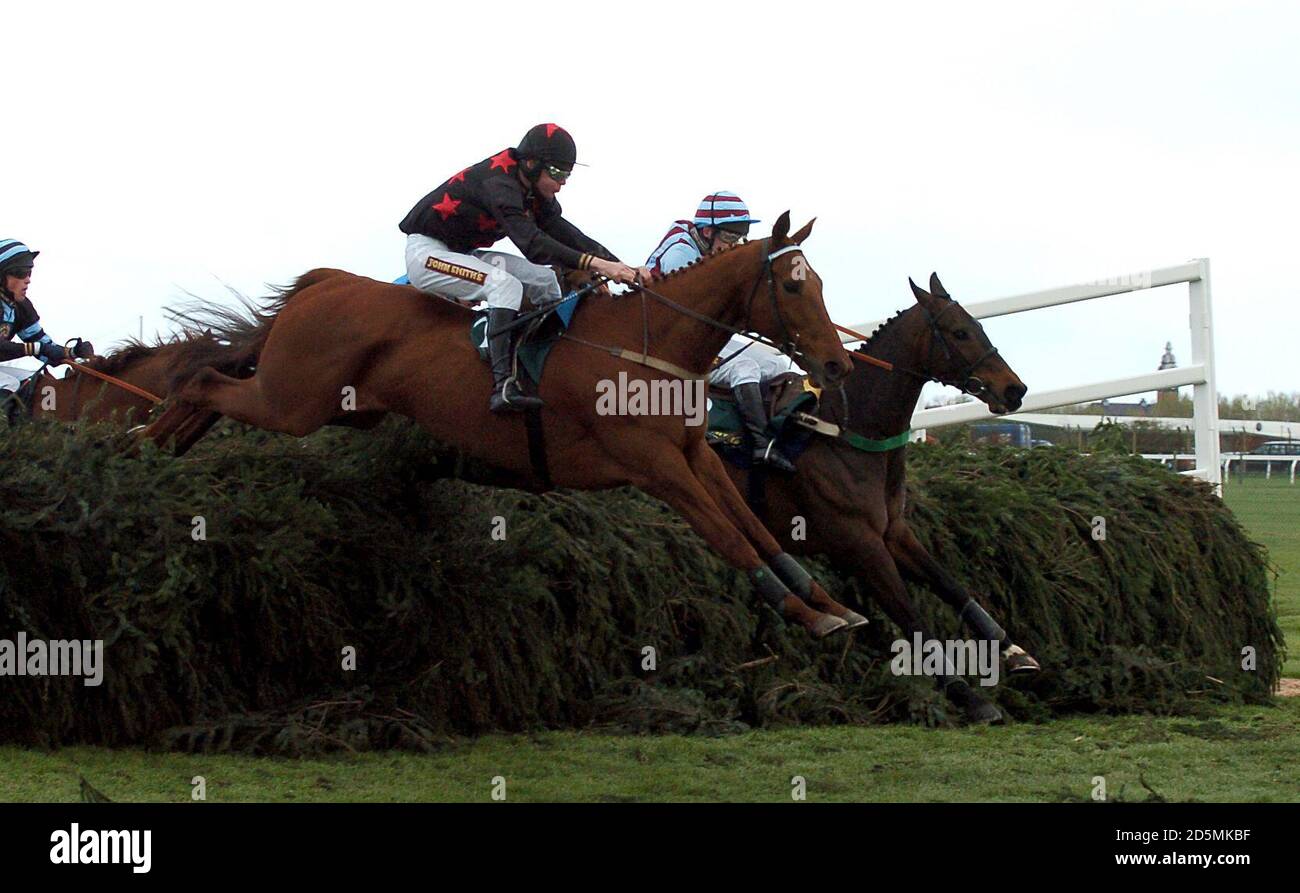 Cregg House ridden by David Russell comes home to win The John Smith's