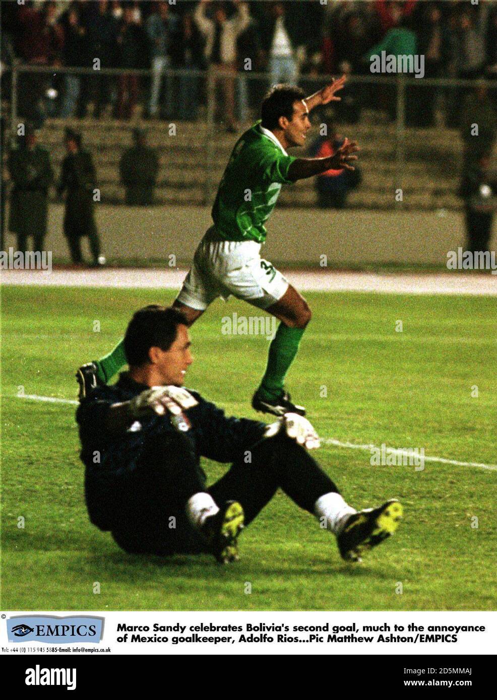 Marco Sandy celebrates Bolivia's second goal, much to the annoyance of Mexico goalkeeper, Adolfo Rios Stock Photo