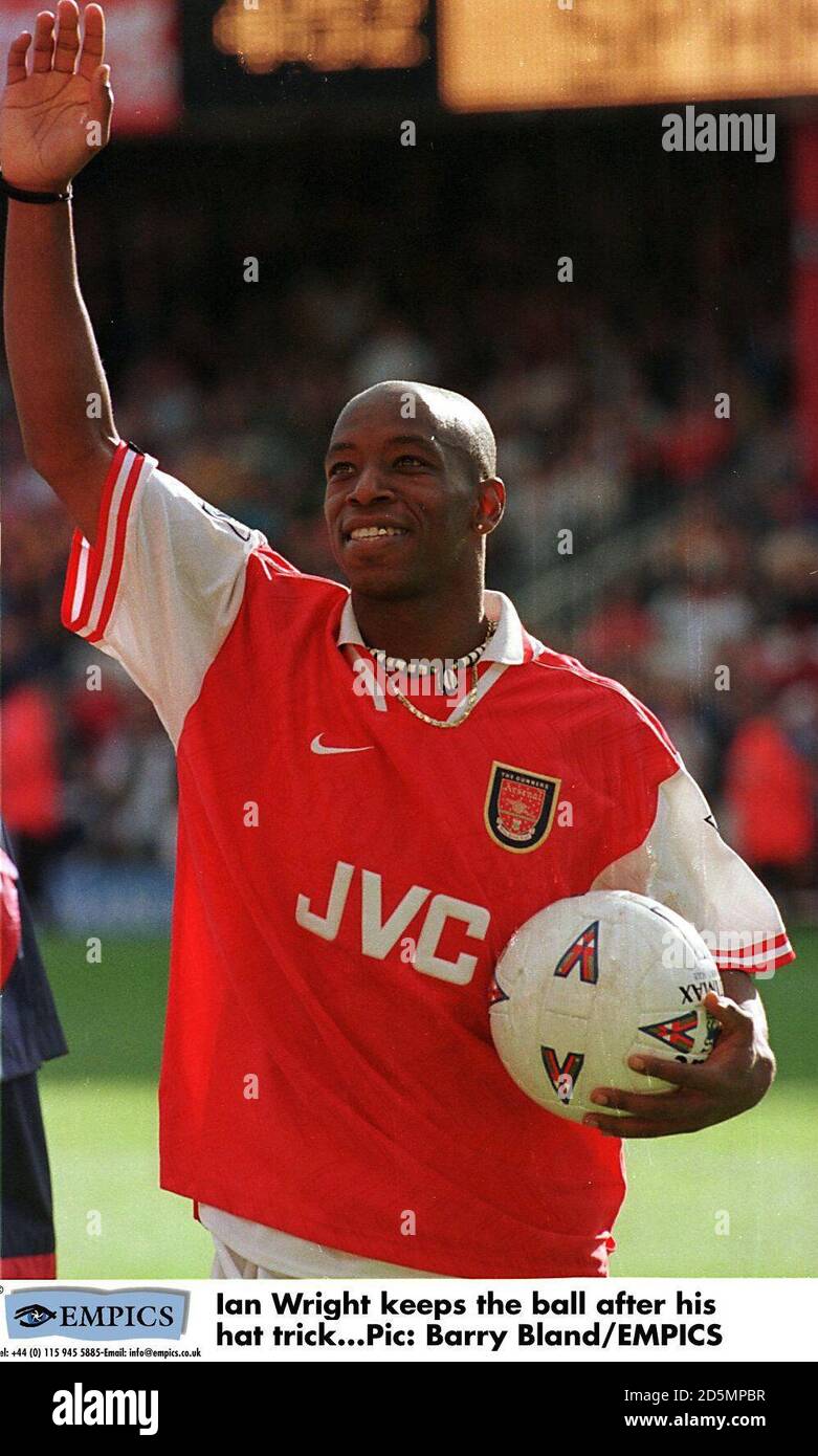 Arsenal's Ian Wright keeps the ball after his hat trick Stock Photo