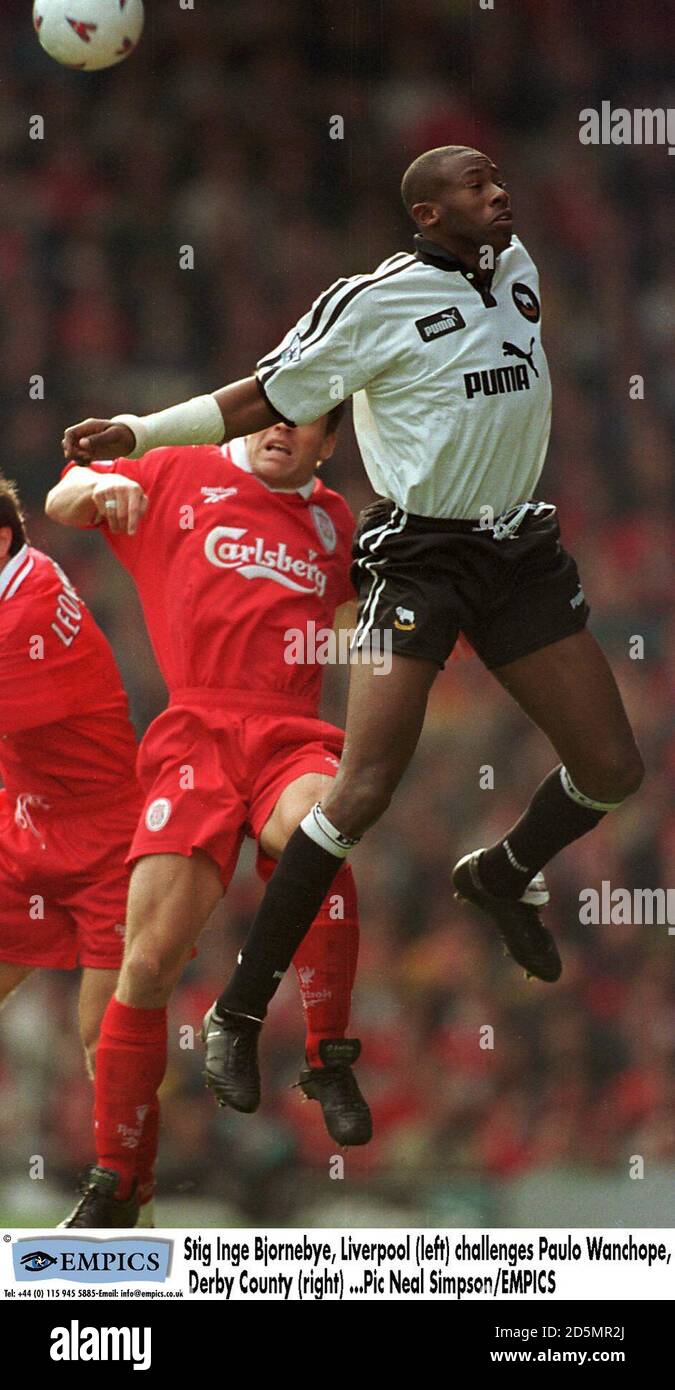 Stig Inge Bjornebye of Liverpool (left) is beaten in the air by Paulo ...