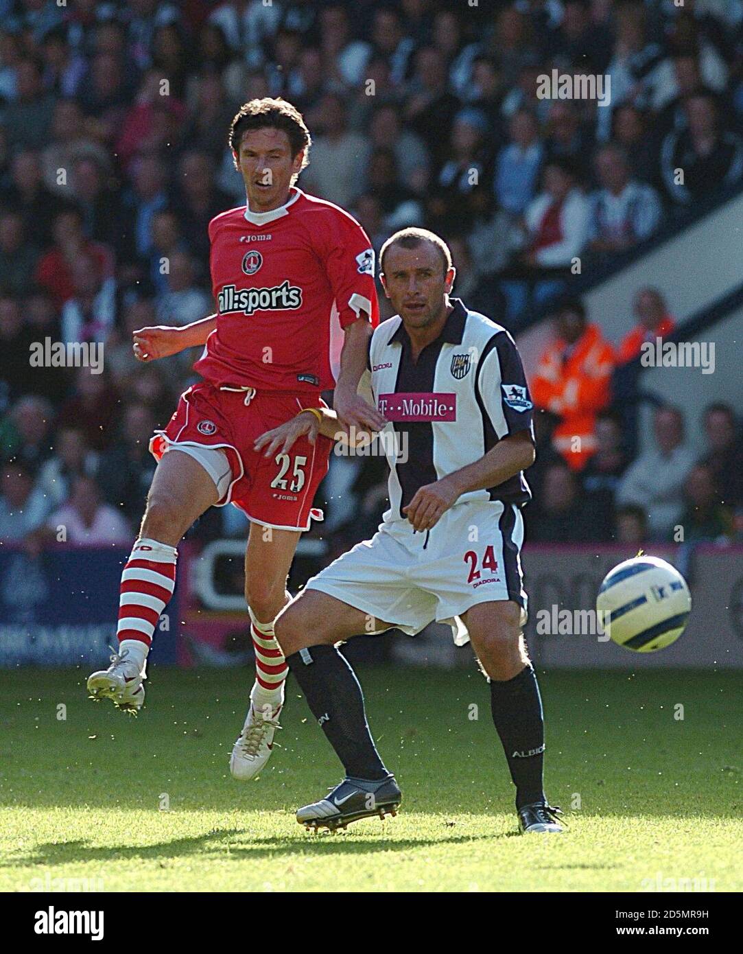 West Bromwich Albion's Ronnie  Wallwork (r) battles with Charlton Athletic's Alexei  Smertin Stock Photo