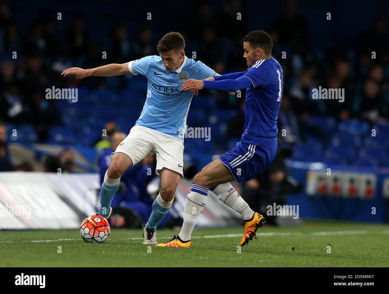 Manchester City's Charlie Oliver (left) and Chelsea's isaac Christie-Davies battle for the ball Stock Photo