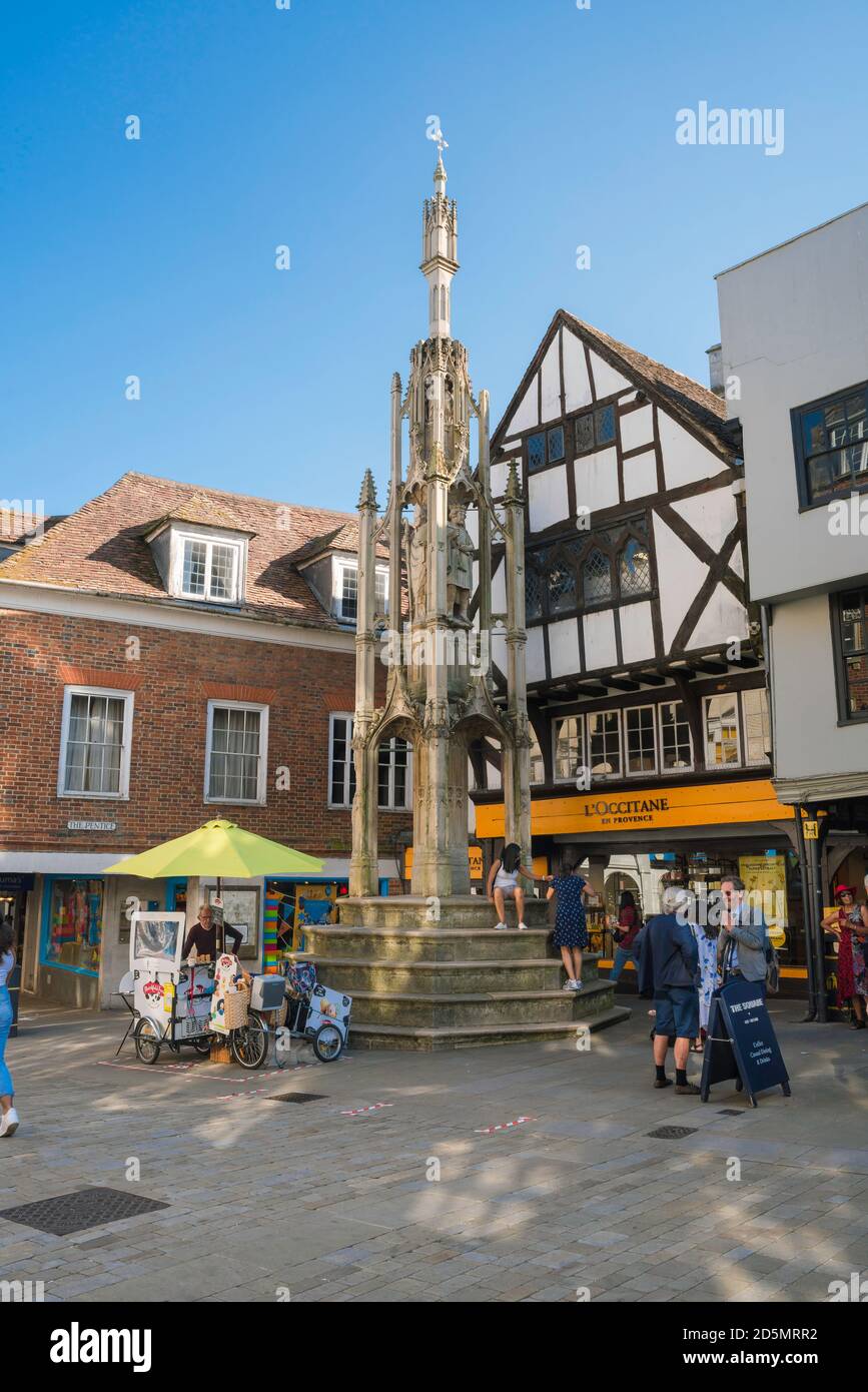 Winchester High Street, view in summer of the historic Buttercross in the city high street, Winchester, Hampshire, England, UK Stock Photo