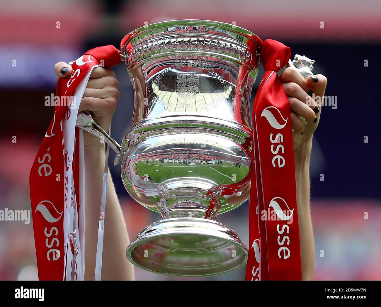 Detail of Arsenal lifting the SSE Women's FA Cup trophy after the game  Stock Photo