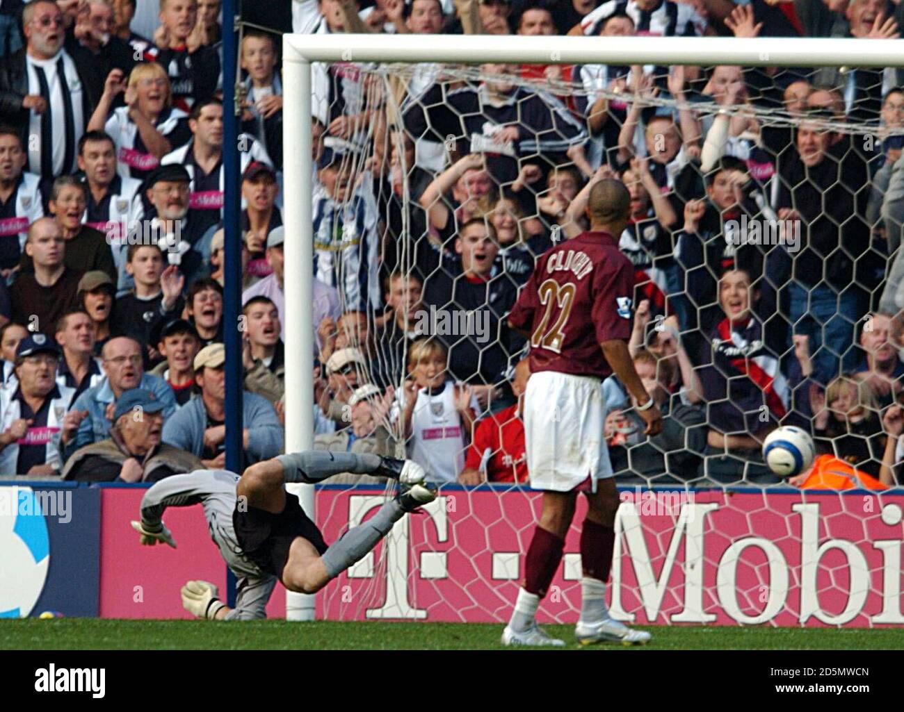 West Bromwich Albion's Darren Carter (out of picture) beats Arsenal's goalkeeper Jens Lehmann Stock Photo