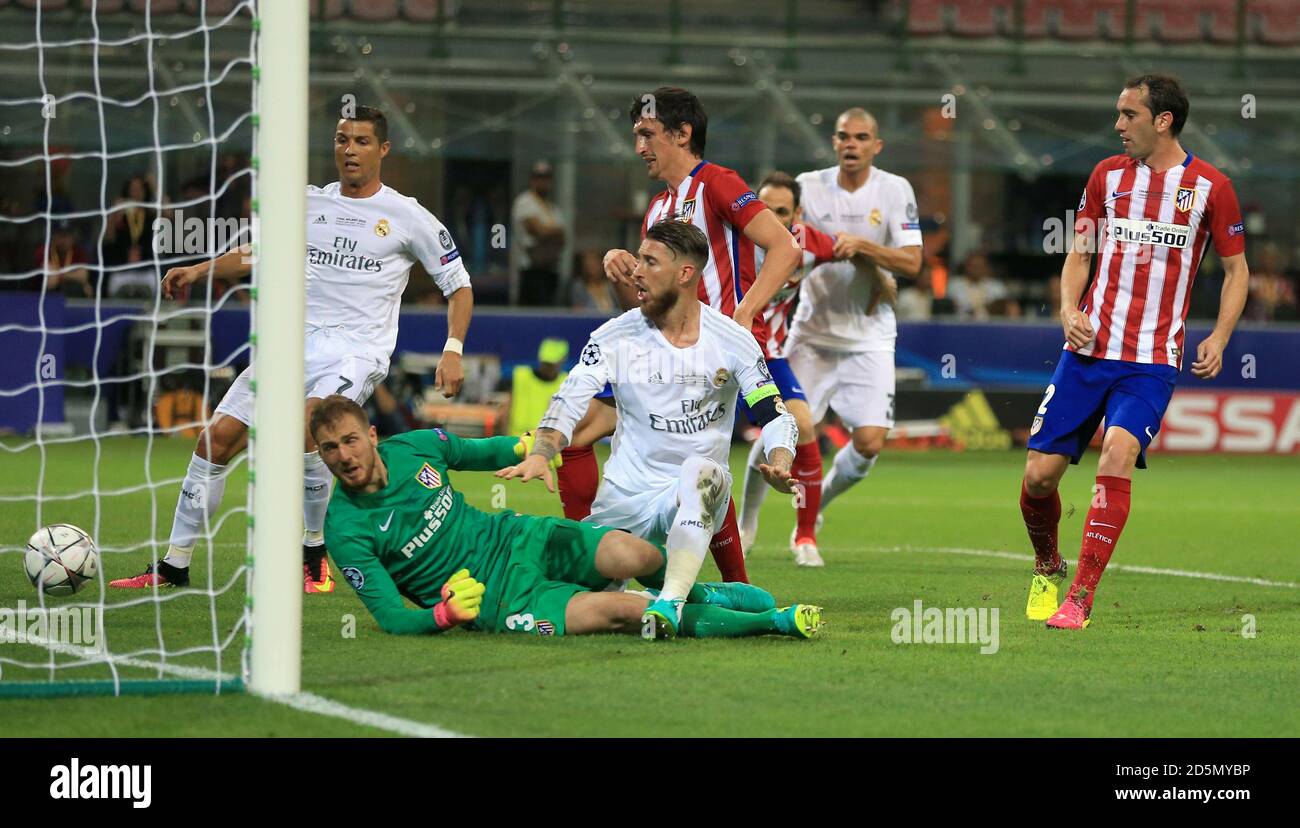 Real Madrid's Sergio Ramos (centre) scores their first goal of the game  Stock Photo