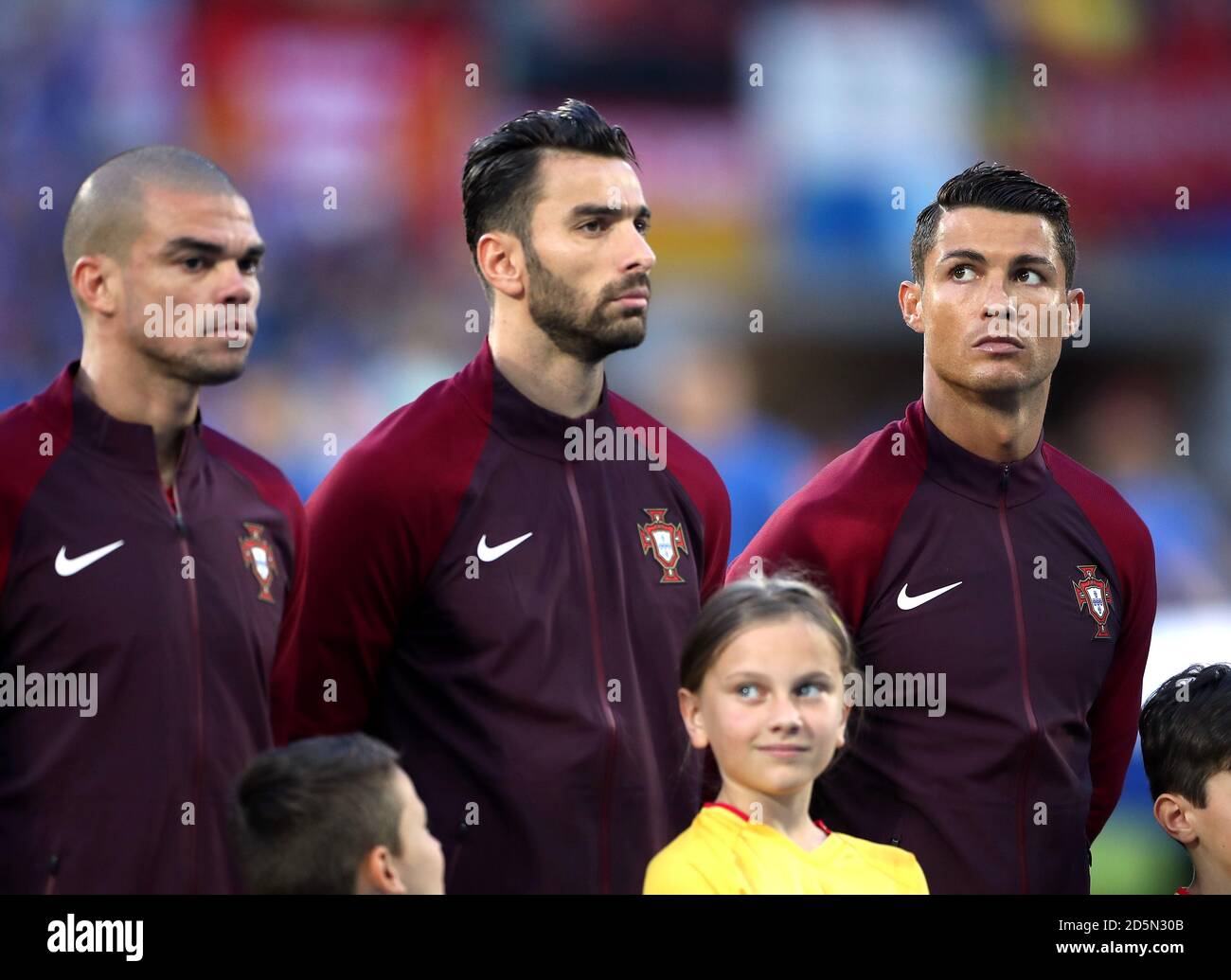 (L-R) Portugal's Pepe, goalkeeper Rui Patricio and Cristiano Ronaldo Stock Photo